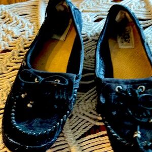 Black Ugg slip and 0n with tassels